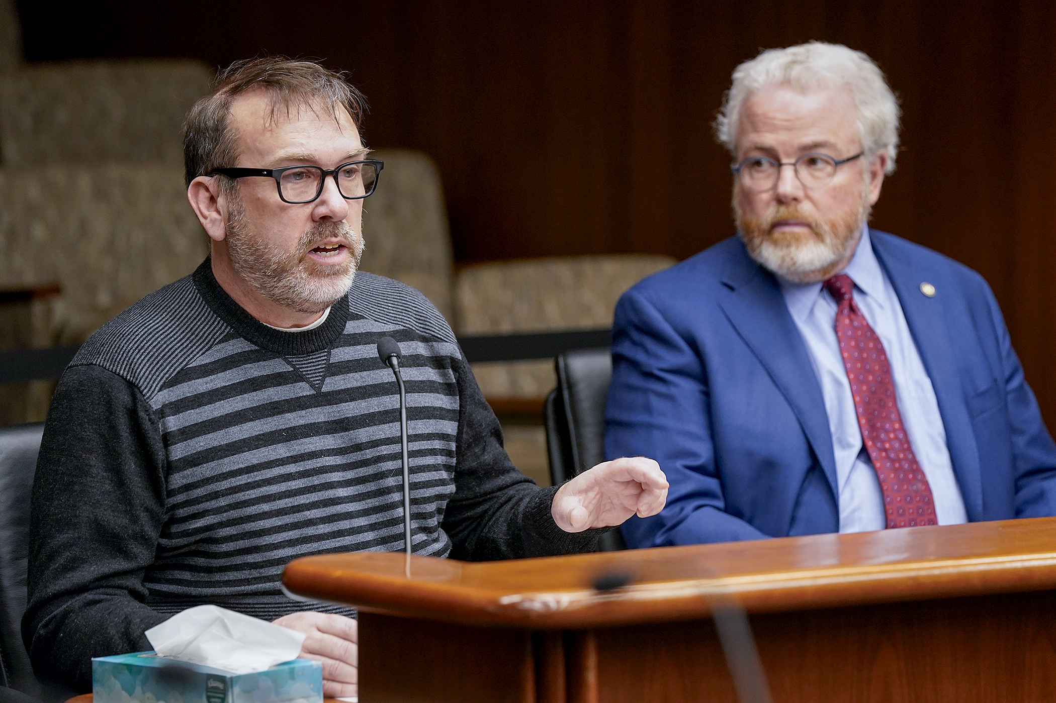 Bobby King, state program director at Solar United Neighbors, testifies April 2 in support of a bill to provide financial incentives to local permitting authorities that use federal developed software to automate and streamline permit reviewing and issuing process for residential solar projects. Rep. Ned Carroll sponsors HF5171. (Photo by Michele Jokinen)